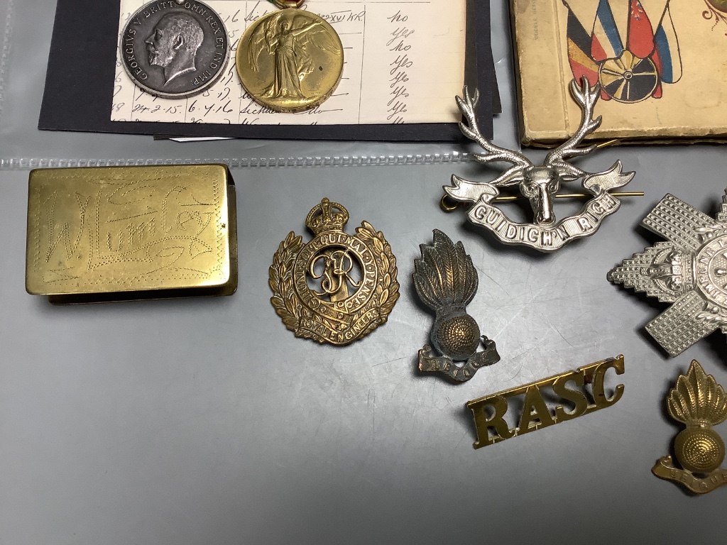 A group of assorted WW1 medals and badges etc